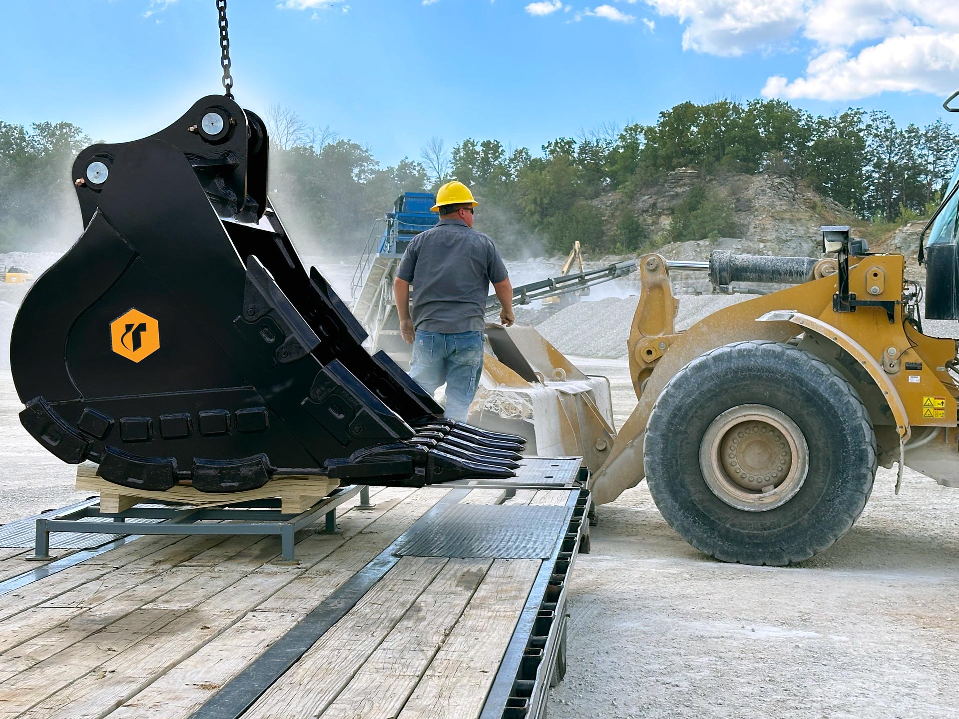 Excavator Rock bucket delivery at a quarry in Branson Missouri.